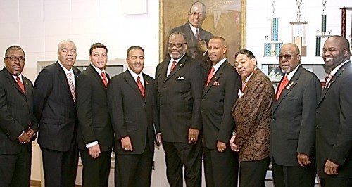 Members of Kappa Alpha Psi Fraternity Inc. gather in front of a painting of one of their founding fathers, Elder Watson Diggs. Pictured left to right are members Richard L. Snow, executive director and chief operating officer; Michael J. Owens, Polemarch, North Central Province; Kristerpher J. Smith, Junior Grand Vice Polemarch; Dwayne M. Murray, Esq., Grand Polemarch; Eugene G. White, superintendent of Indianapolis Public Schools; Senior Grand Vice Polemarch William “Randy” Bates Jr., Esq.; William G. Mays, president of Mays Chemical Co.; Arthur L. Carter Sr.; and Eugene L. Murray, Polemarch of the Indianapolis Alumni Chapter.