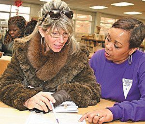 Maureen Nelson (left) seeks information from College Goal Sunday program coordinator Terri Cooley during the event, which provided students of all ages advice on obtaining state and federal grants. (Photos/C. Guynn)