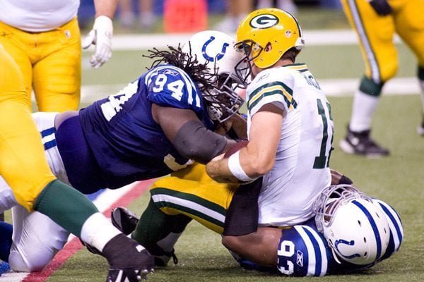COLTS # 94- DRAKE NEVIS & GREEN BAY # 12 ARAON RODGERS & COLTS # 93 DWIGHT FREENEY.