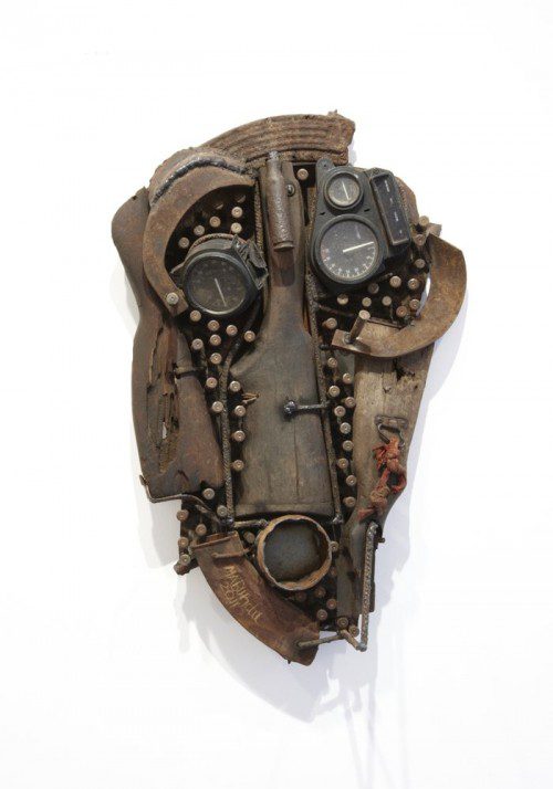 

<p>A tribal-inspired mask made from a rifle butt, bullets and other military equipment by Mozambican sculptor Goncalo Mabunda.</p>
<p>“><figcaption class=