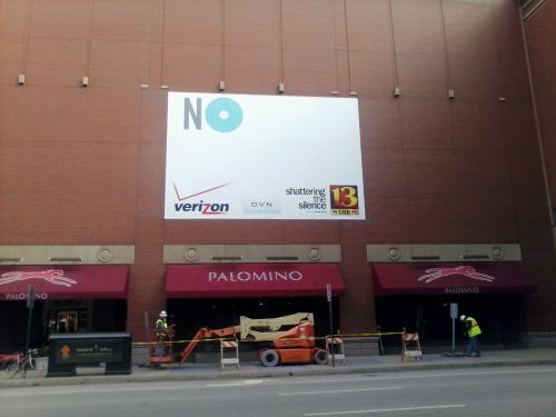 

<p>Installers finish day one of art display above the Palomino restaurant in downtown Indianapolis</p>
<p>“><figcaption class=