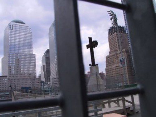 

<p></noscript>The iconic World Trade Center cross — two intersecting steel<br />
beams that held up when the Twin Towers collapsed on September 11,<br />
2001 — was moved Saturday to its new home at the nearby 9/11<br />
Memorial and Museum.</p>
<p>“><figcaption class=