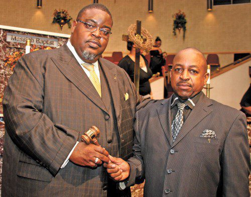 Stephen J. Clay accepts the Minister’s Alliance presidential gavel from Rayford Brown.