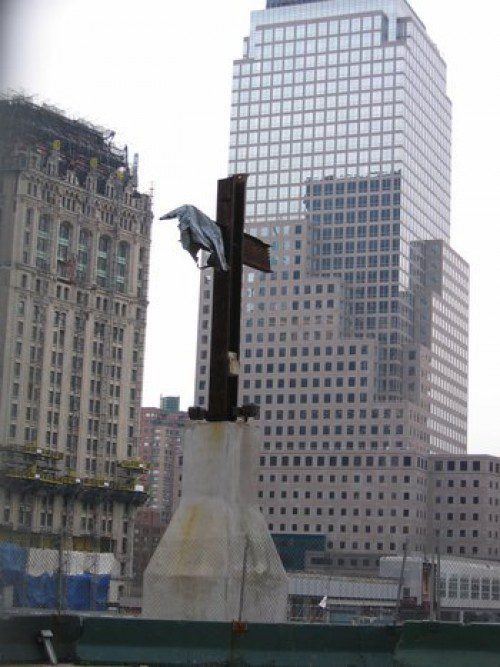 

<p></noscript>The iconic World Trade Center cross — two intersecting steel<br />
beams that held up when the Twin Towers collapsed on September 11,<br />
2001 — was moved Saturday to its new home at the nearby 9/11<br />
Memorial and Museum.</p>
<p>“><figcaption class=