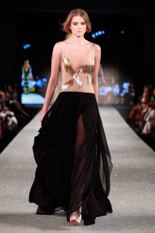

<p>Arise Magazine Fashion Week was held in Lagos, Nigeria last week. It aims to showcase African fashion to the world. A model takes to the catwalk wearing a creation of South African designer Gavin Rajah.</p>
<p>“><figcaption class=