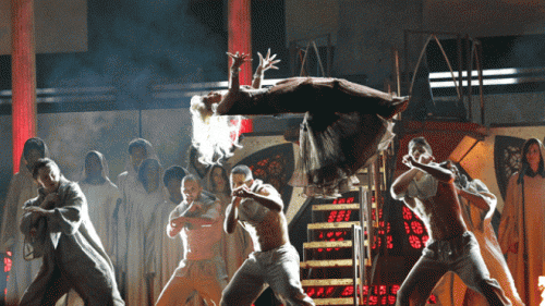 <p>Nicki Minaj leviatates during her Grammy performance.</p>
<p>“><figcaption class=
