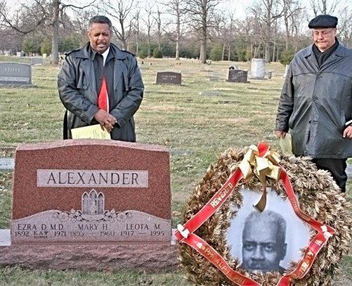 Phillip E. Burton (left) and Myron Hardiman pray at the gravesite. Kappa Alpha Psi was founded on the campus of Indiana University on Jan. 5, 1911.