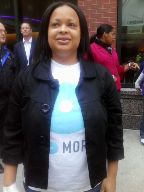 

<p>A DVN representative wears the turquoise doughnut in observance of the No More campaign</p>
<p>“><figcaption class=