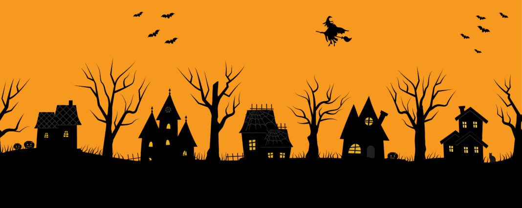 Halloween houses. Spooky village. Seamless border. Black silhouettes of houses and trees on an orange background. There are also bats, pumpkins and a witch on a broomstick in the picture. Vector