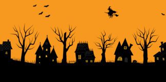 Halloween houses. Spooky village. Seamless border. Black silhouettes of houses and trees on an orange background. There are also bats, pumpkins and a witch on a broomstick in the picture. Vector