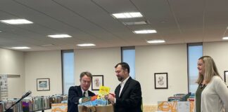 Mayor Joe Hogsett and Sondhi Solutions external relations director Jeff Roeder at Season's Readings press conference