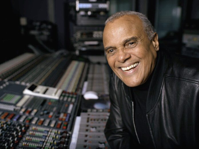 Harry Belafonte FILE - Actor and singer Harry Belafonte poses for a portrait at a New York recording studio, Nov. 1, 2001. Belafonte died Tuesday of congestive heart failure at his New York home. He was 96. (AP Photo/Leslie Hassler, File)