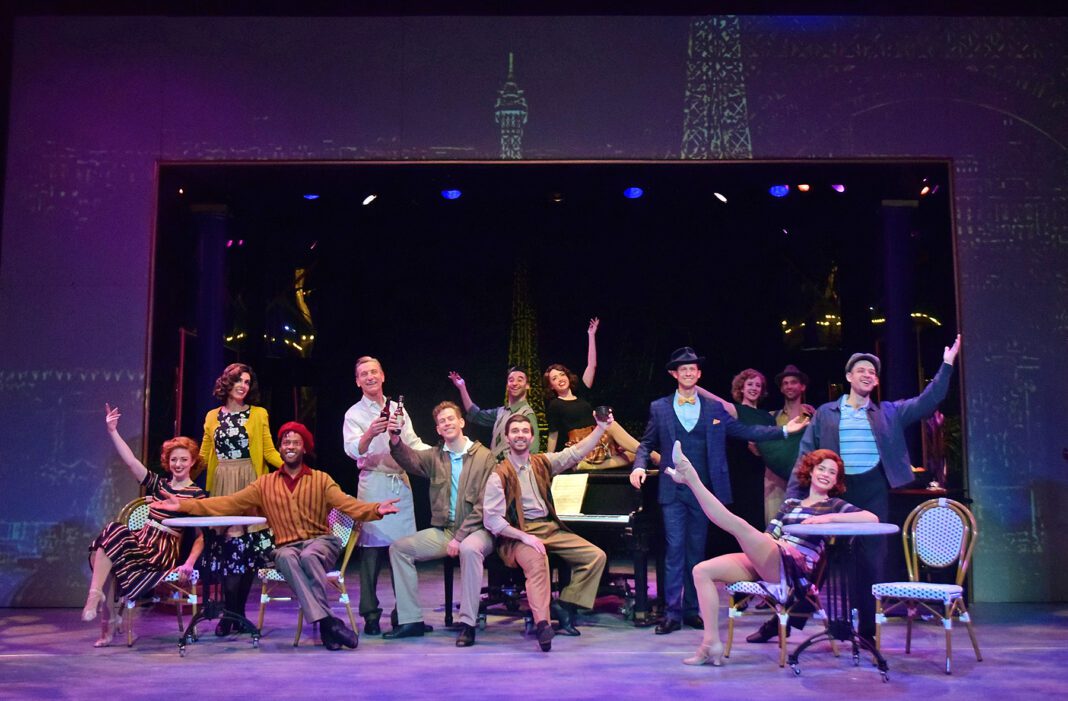 The Company of Beef & Boards Dinner Theatre’s production of “An American in Paris,” sings “I Got Rhythm.”