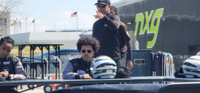 Coach Rod Reid and NXG Youth Motorsports Racer Ronnie preparing to take the track at the Indianapolis Motor Speedway. (Photo/Noral Parham III)