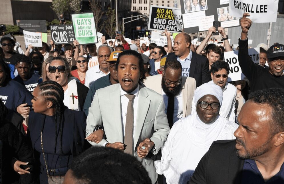 State Rep. Justin Jones, D-Nashville, center, marches with supporters to the state Capitol Monday, April 10, 2023, in Nashville, Tenn. (AP Photo/George Walker IV)