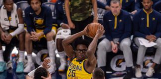 Indiana Pacers backup big Jalen Smith (25) double-teamed by OKC thunder forwards Aaron Wiggins (21) and Aleksej Pokuševski (17) on his way to the basket. (Photo/Walt Thomas)