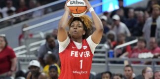 Indiana Fever forward NaLyssa Smith (1) in action as the Connecticut Sun played the Indiana Fever during a WNBA basketball game, Friday, May 19, 2023, in Indianapolis. (AP Photo/AJ Mast)