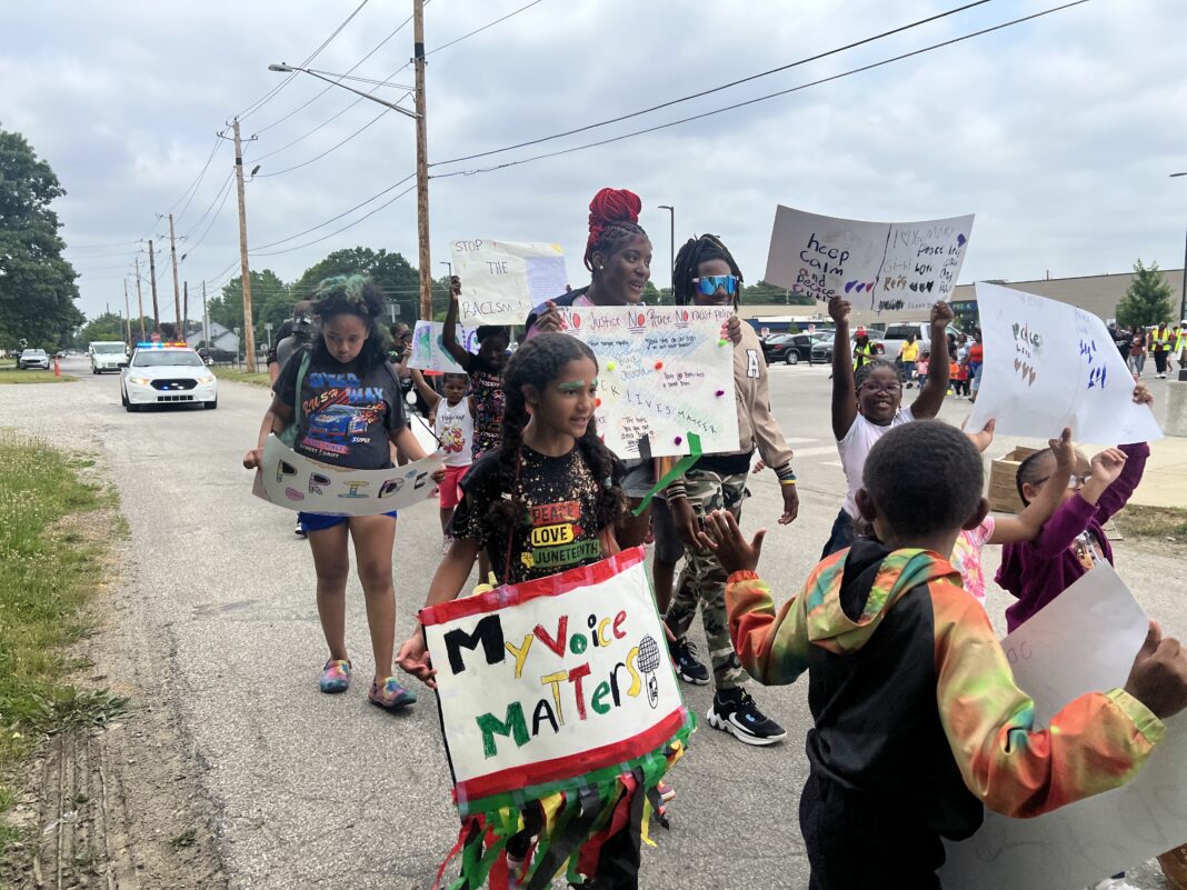 Little feet hit the concrete for the fourth annual Community Peace Walk