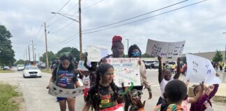 Little feet hit the concrete for the fourth annual Community Peace Walk