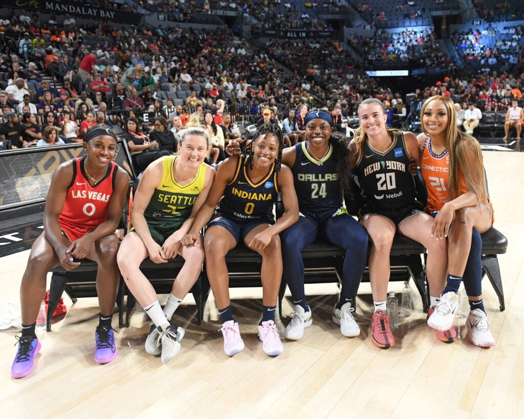 Indiana Fever; WNBA; All-Star; 2023 Season; Las Vegas; Jackie Young #0 of the Las Vegas Aces, Sami Whitcomb #32 of the Seattle Storm, Kelsey Mitchell #0 of the Indiana Fever, Arike Ogunbowale #24 of the Dallas Wings, Sabrina Ionescu #20 of the New York Liberty & DiJonai Carrington #21 of the Connecticut Sun poses for a photo during the 2023 WNBA Skills Challenge as part of the 2023 WNBA All-Star Friday on July 14, 2023 at Michelob ULTRA Arena in Las Vegas, Nevada. (Photo/Getty Images)