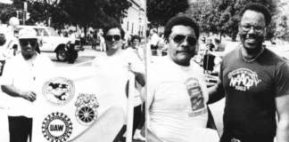 Union members gathered in Indianapolis to celebrate Labor Day and to emphasize the importance of unions. In the left photo, Columbus Mabry and Sue Leats carry the banner of the United Auto Workers Union, while at right Delarno Bryant of UAW and Charles Poindexter of the NAACP participate. September 5, 19383