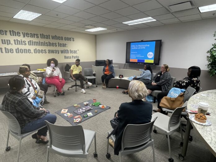 Staff and volunteers at the Brightwood Community Center in Healing Circle Training, learning to assist victims and survivors of domestic violence. (Photo provided/Shonna Majors)