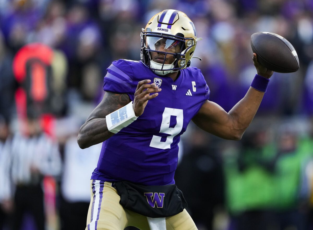 Washington quarterback Michael Penix Jr. looks to throw against Washington State during the second half of an NCAA college football game Nov. 25, 2023, in Seattle. The biggest Washington players allowed only 11 sacks this season, paving the way for Penix and No. 2 Huskies to reach the College Football Playoff and earning the Joe Moore Award as the best offensive line in the country. (AP Photo/Lindsey Wasson) . Used for Michigan vs Washington CFP National Championship story