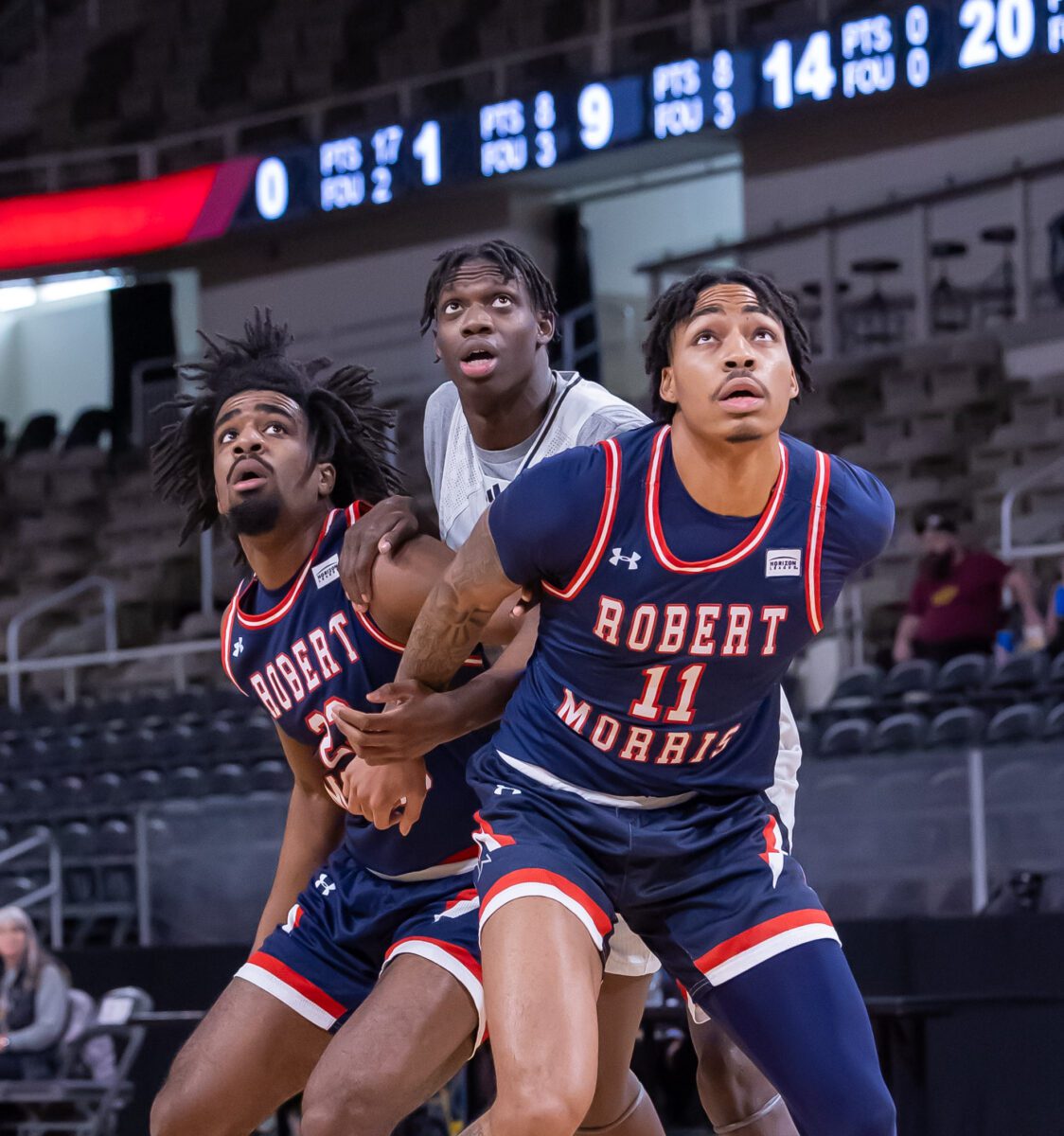 Multiple Robert Morris Colonial defenders attempt to box out IUPUI jaguar Abdou Samb during their basketball game at Indiana Farmers Coliseum, located near Indianapolis' eastside, on January 20, 2024. (Photo/Walt Thomas)