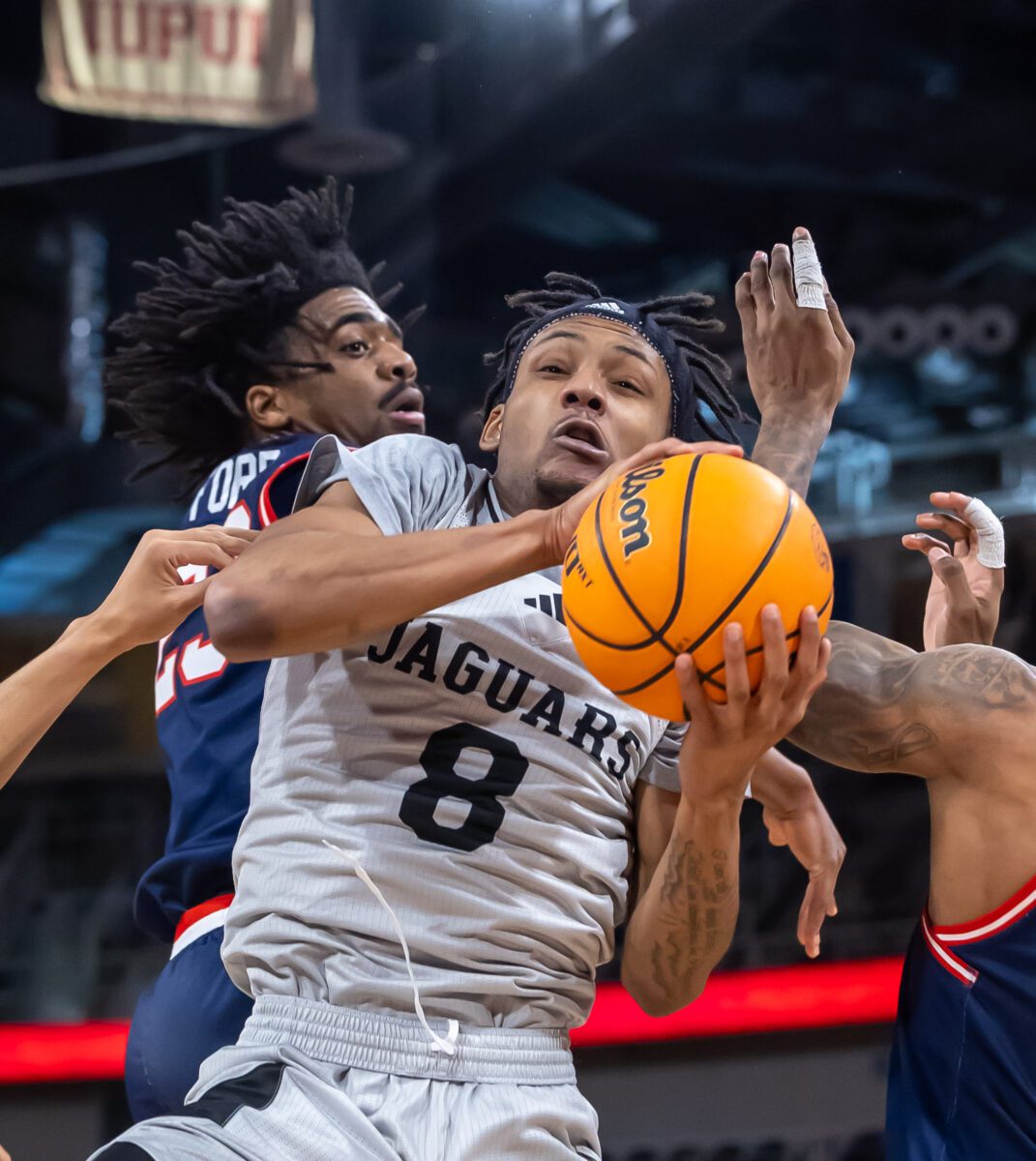 IUPUI Jaguar Kidtrell Blocker (8) gets to work against the Robert Morris Colonials during their basketball game at Indiana Farmers Coliseum, located near Indianapolis' eastside, on January 20, 2024. (Photo/Walt Thomas)