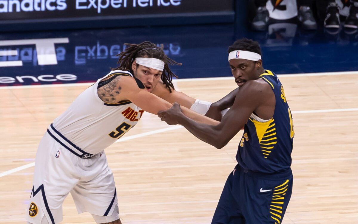 Indiana Pacers forward Pascal Siakam gets tangled up with Nuggets forward Aaron Gordon during their matchup at Gainbridge Fieldhouse in Indianapolis, IN. on January 23, 2024. (Photo/Walt Thomas)