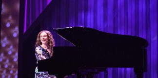 Devon Perry plays the iconic Carole King in Beef & Boards Dinner Theatre's production of Beautiful: The Carole King Musical, now on stage through March 30. (Photo/Indy Ghost Light)