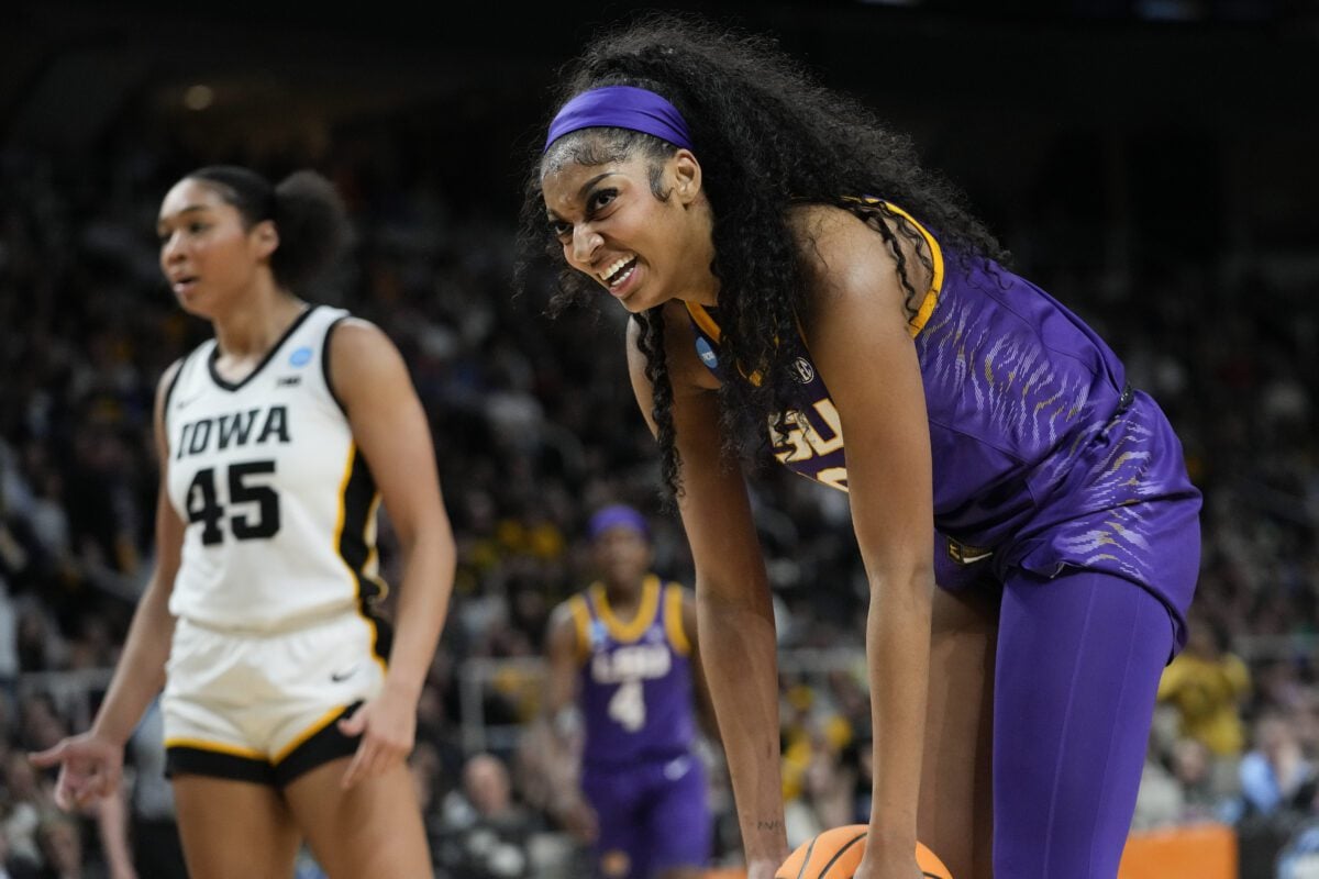 LSU forward Angel Reese and Iowa forward Hannah Stulhke during NCAA women's basketball Elite Eight in 2024.