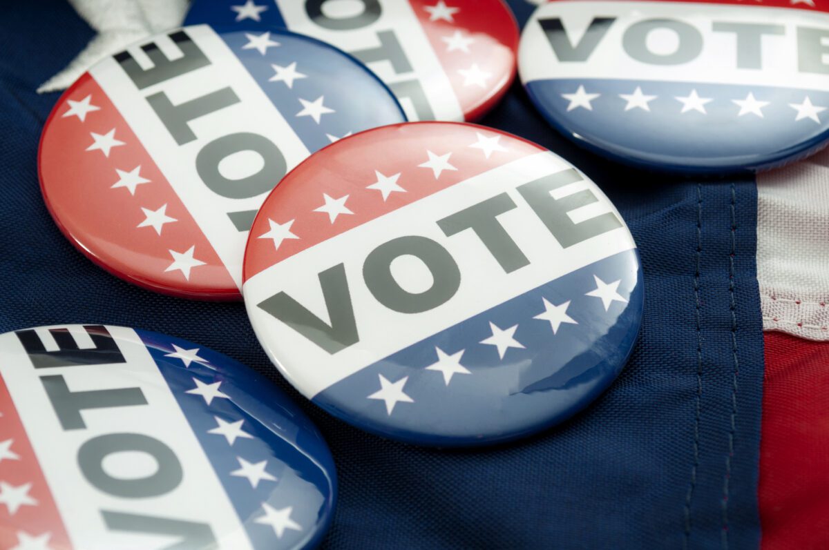 Democrat vs republican poll, democratic decision and primary voting conceptual idea with Vote election campaign button badges and the united states of america flag (Photo/Getty Images)
