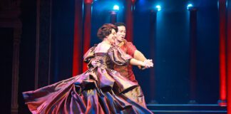 Anna (Hannah Louise Fernandes) and the King (Jae Woo) perform “Shall We Dance” in Beef & Boards Dinner Theatre’s production of Rodgers and Hammerstein’s The King and I, now on stage through May 19. (Photo/Indy Ghost Light)