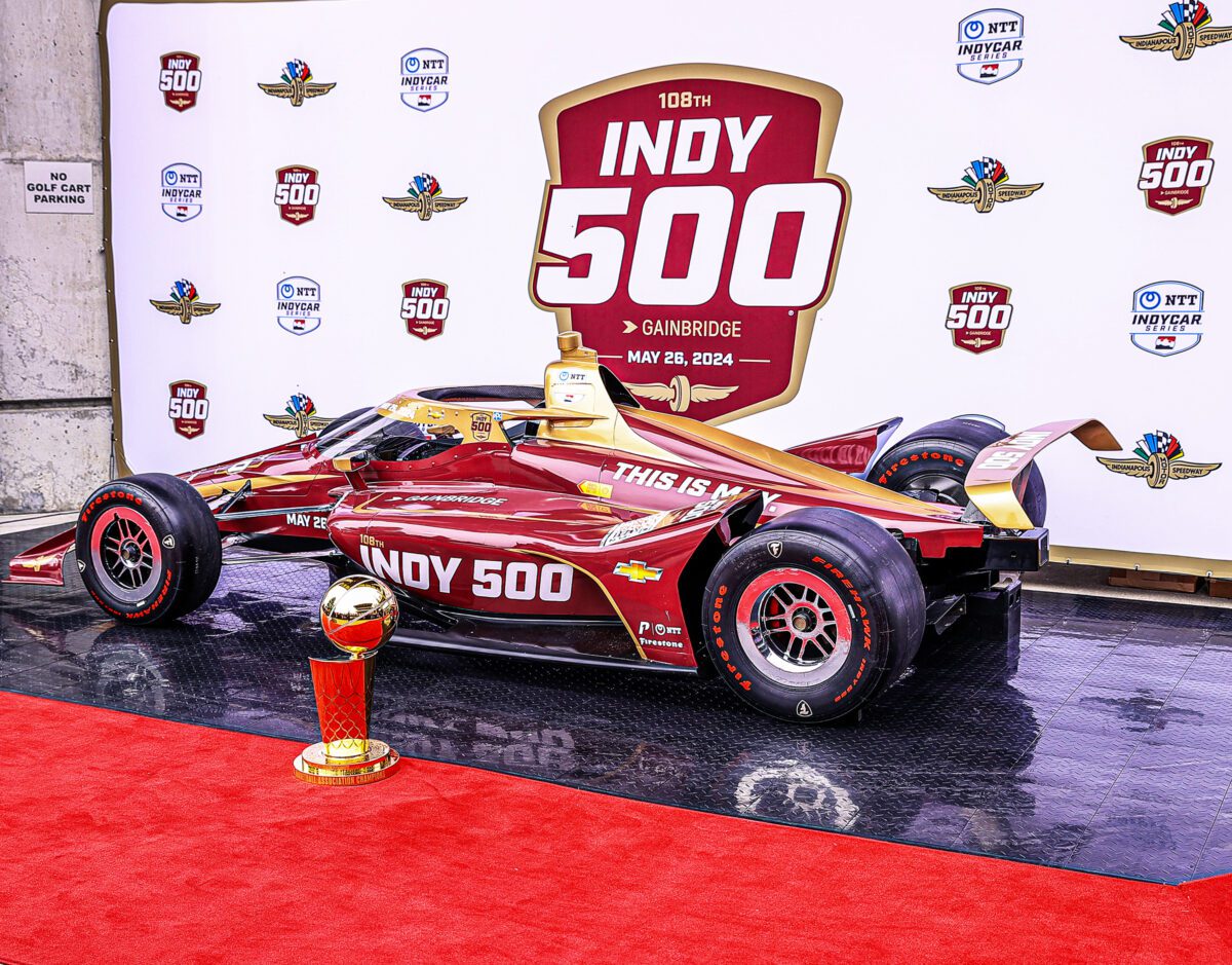 Race car and NBA finals trophy during the Indianapolis 500 at the Indianapolis Motor Speedway.