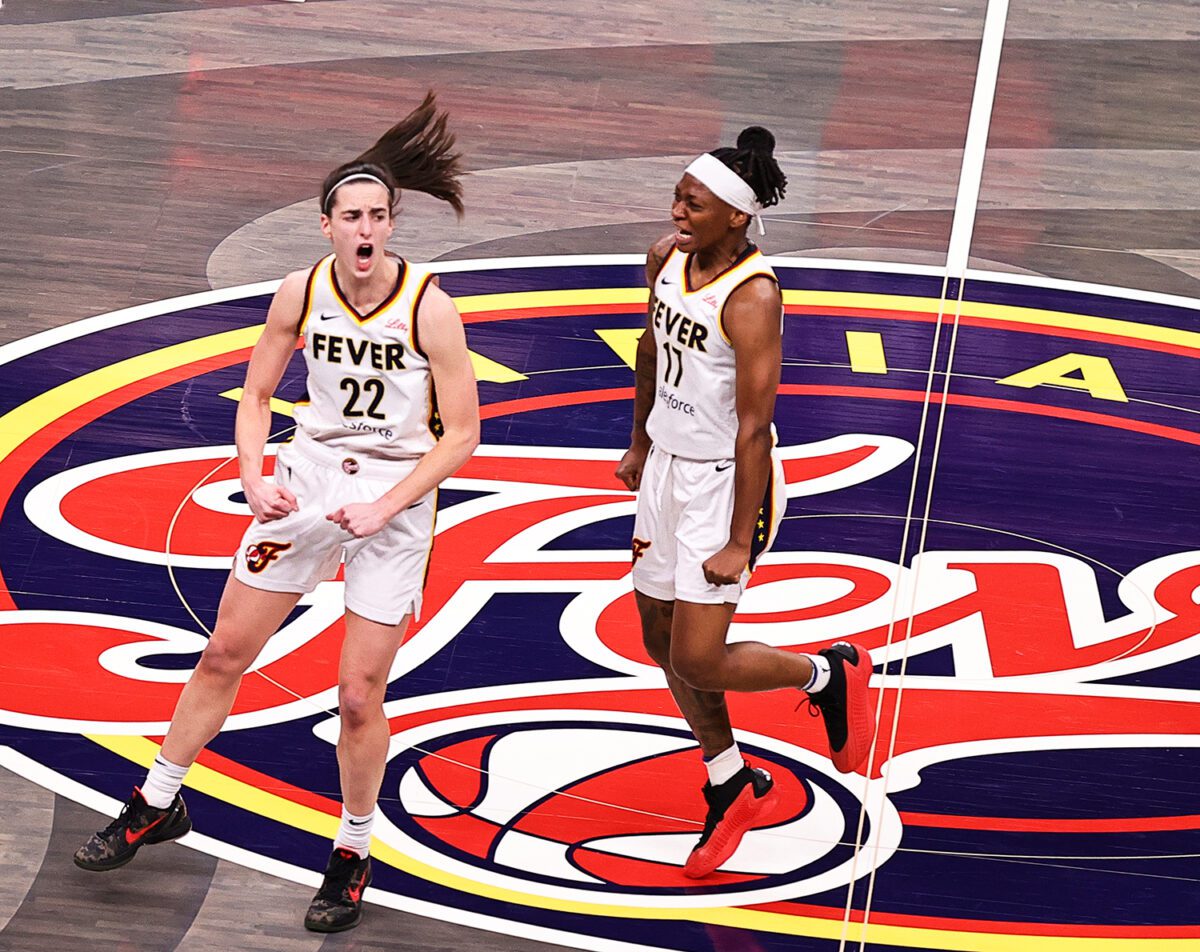 Indiana Fever guards Caitlin Clark, left, and Erica Wheeler celebrating after Clark's big basket to take the lead during their game against the Connecticut Sun on May 20 2024. (Photo/David Dixon)
