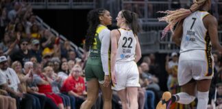 WNBA players arguing during a game.