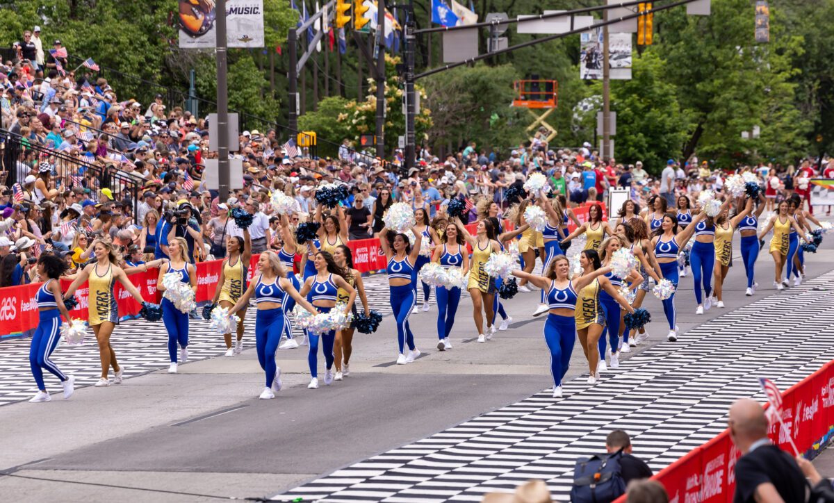 Cheerleaders and marching band during 2024 500 Festival Parade in Indianapolis.