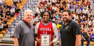 basketball player with MVP award during Indiana Futures Game.