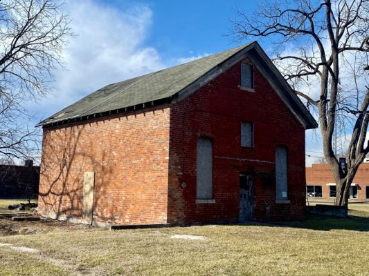 An older red brick schoolhouse