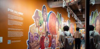 At the entrance to the Polklore Micro-Museum, a mural painted by Cierra Johnson features a collage of the people and artifacts who make up the history of Martindale-Brightwood.