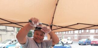 man grilling burgers