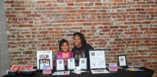 KaMara “KK” White, licensed therapist and children’s book author, promoting her work “Brown Girls Can” with her daughter Laila. (Photo provided/KaMara White)