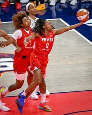Kelsey Mitchell shoots a layup.