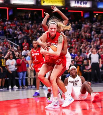 Lexie Hull secures a rebound during a WNBA Game