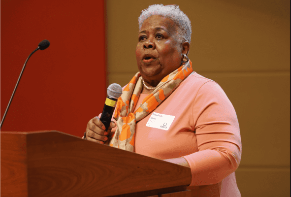 Elizabeth Gore speaks at the Lead Indy Summit on the lead in the soil in Martindale Brightwood and the uphill battle residents are facing to mitigate the issue.
