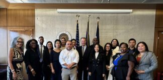 group of students pose with Hogsett