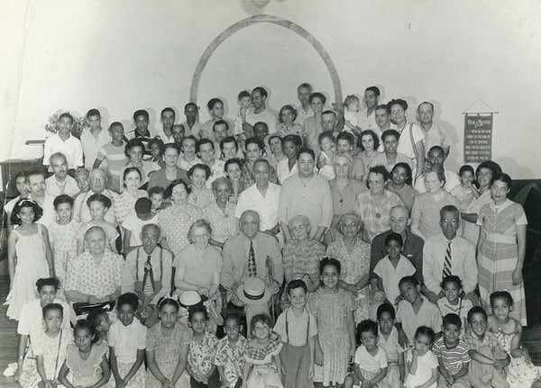 a black and white photo of a homecoming