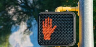LED crosswalk sign in "don't walk" mode.