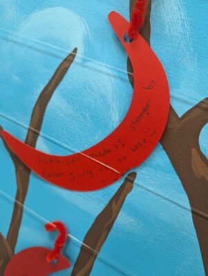 sickle cell writing on art work, art therapy piece at Riley